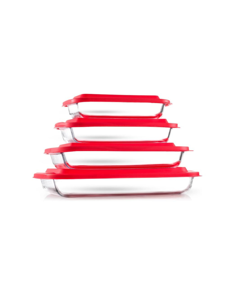 4 Borosilicate Glass Oven Dishes with Airtight Red Lids On The Table